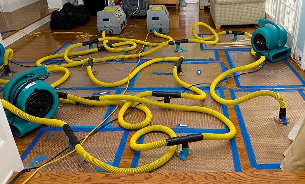 Professional Storm Water Damage Restoration technician working in Macksburg, OH
